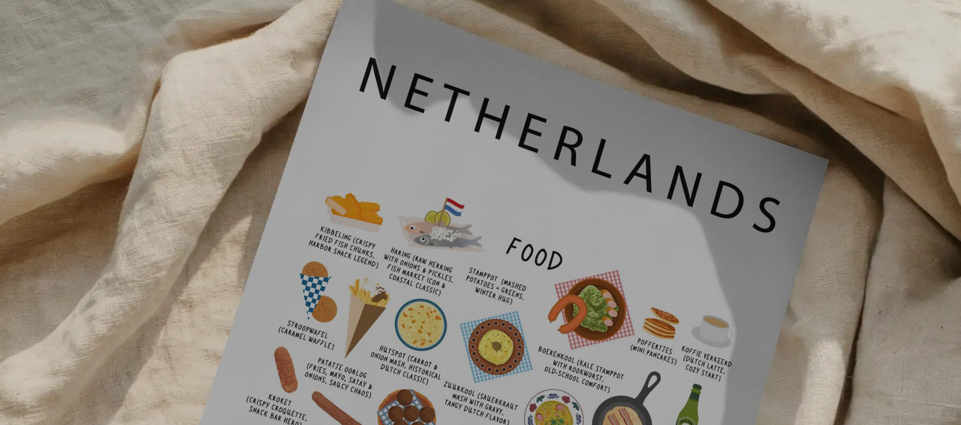 Maison Maps Netherlands food poster styled on soft cream linen in warm sunlight